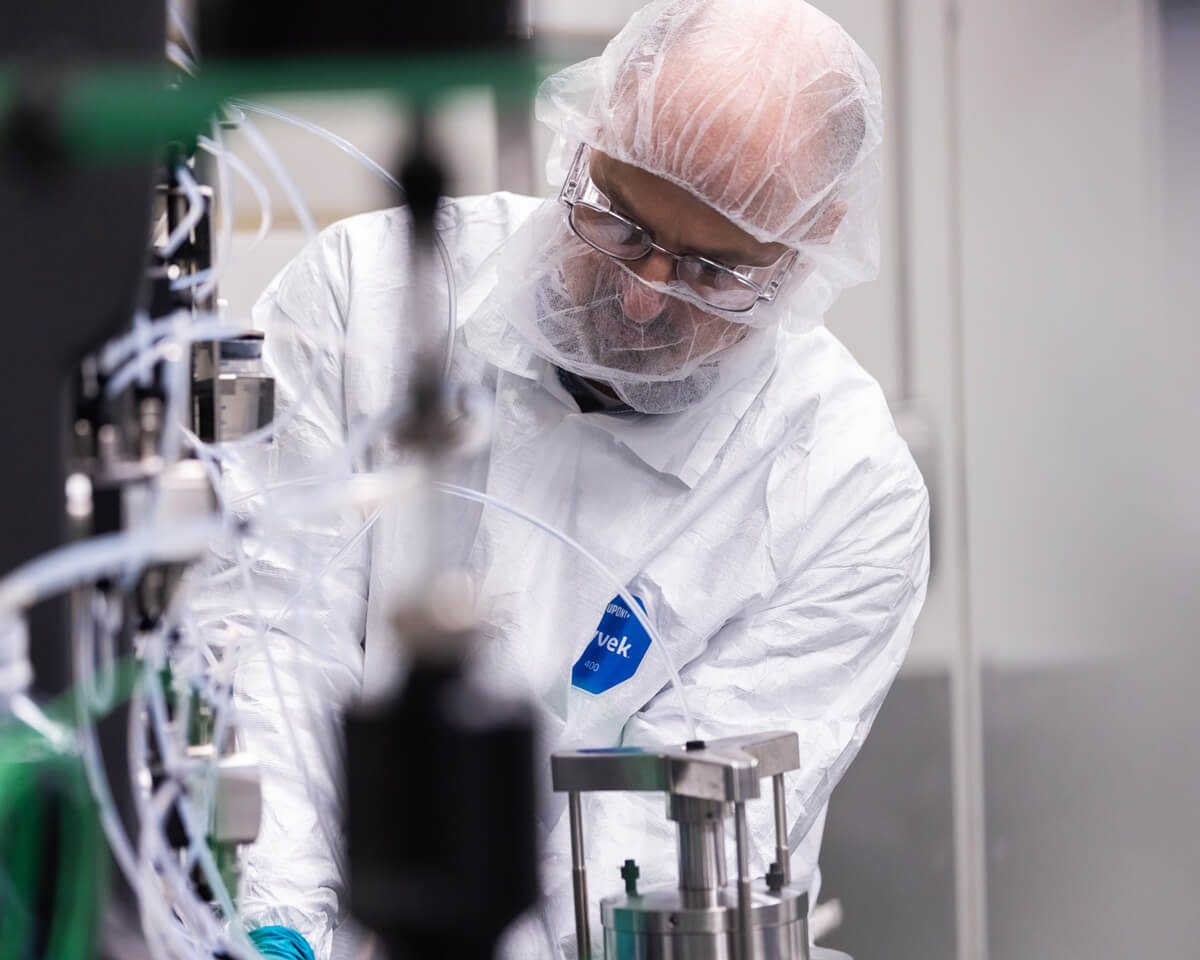 A scientist at a CDMO providing activated polymer services